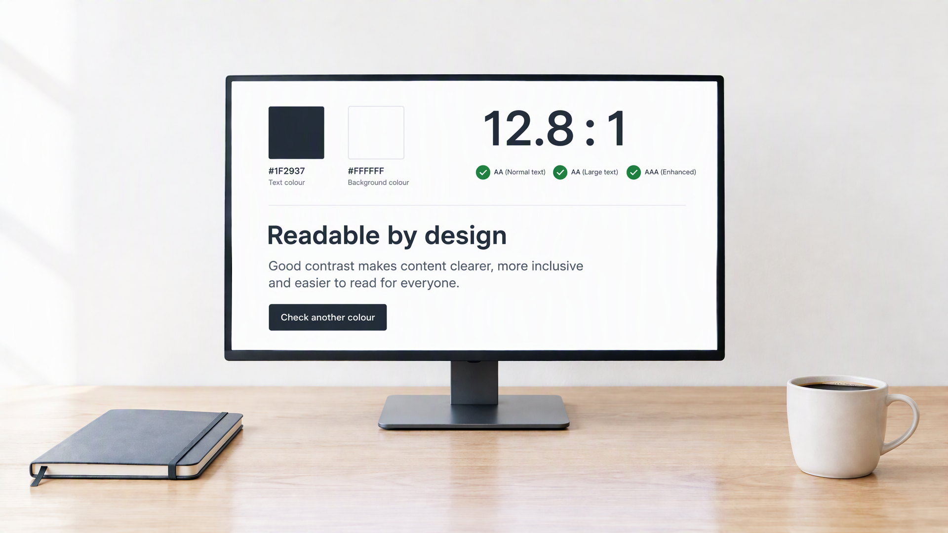 Light theme contrast checker on a monitor at a bright minimalist desk